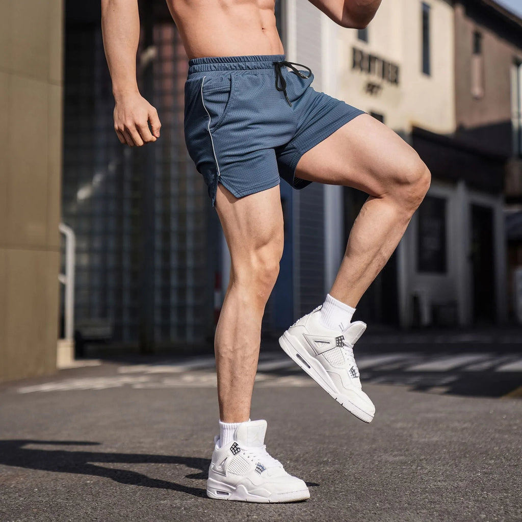 Men's straight-cut polyester fitness shorts in black, available in sizes M to 3XL for sports and casual wear