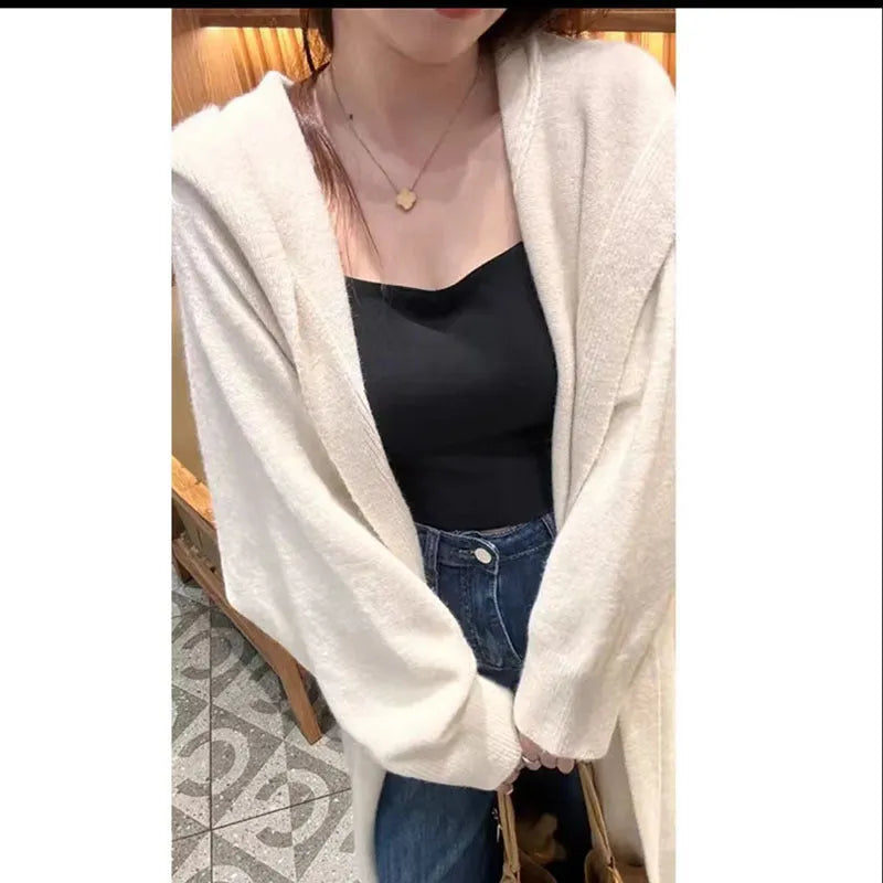 Korean style long hooded knitted cardigan coat for women in a loose free size.