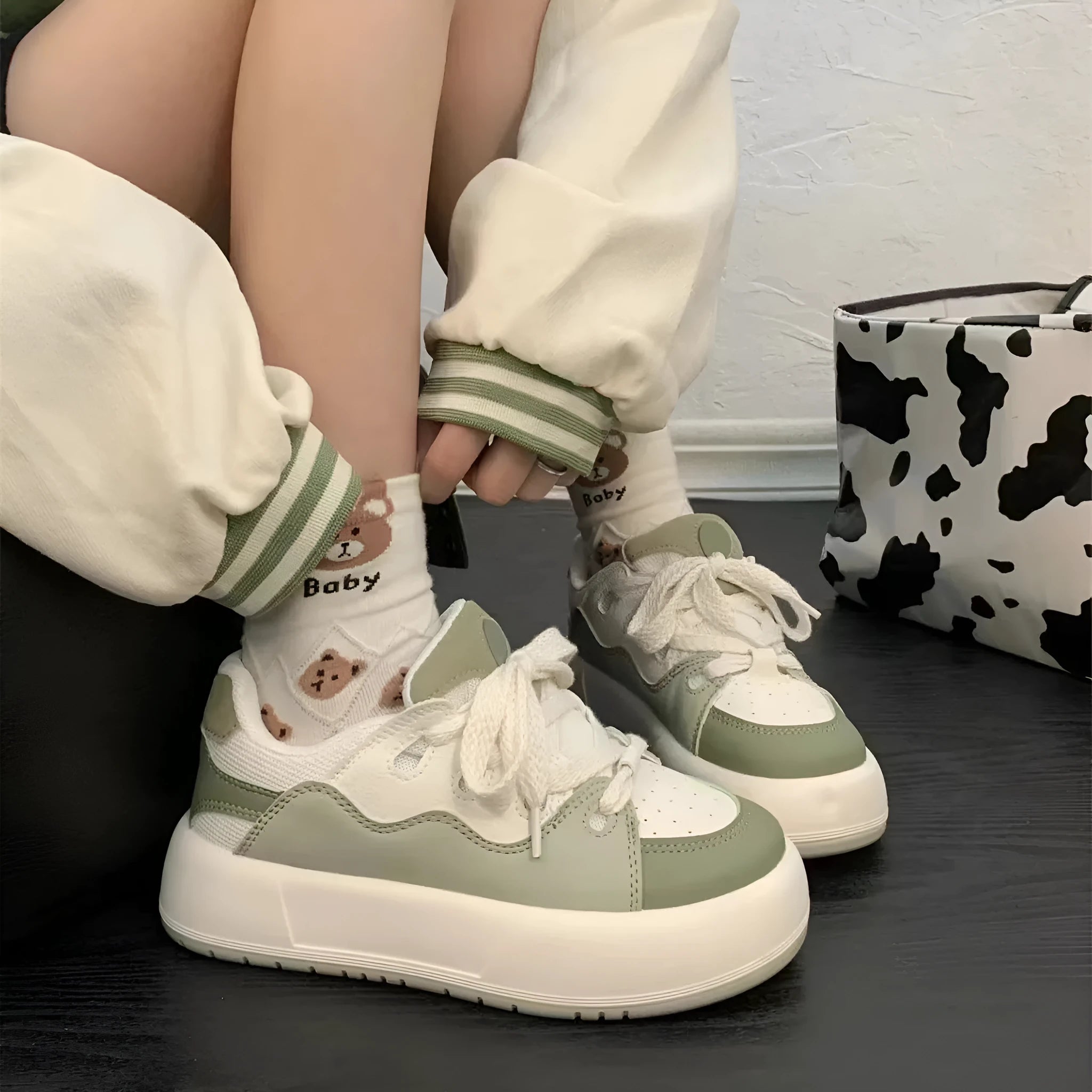Women's green casual shoes with a round toe and flat heel, made from breathable PU mesh.