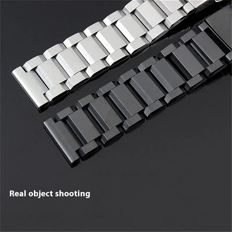 Solid stainless steel watch strap with double-security buckle and quick release pins in silver finish on black background