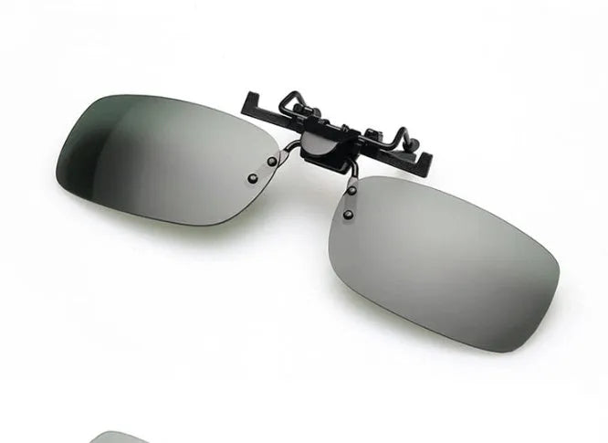 Clip-on driving sunglasses with plastic frame in grey, dark green, and night vision lens options.