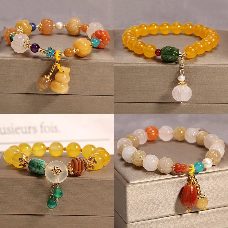 Khaki yellow agate and crystal women's bracelet on gold silk string.
