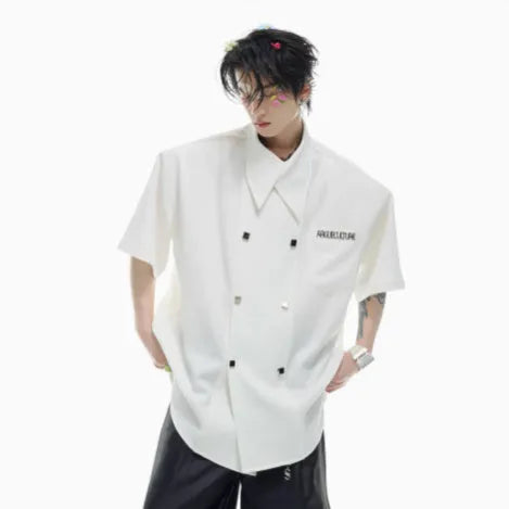 Men's loose casual short-sleeved summer shirt in black with splicing detail and metal buttons.