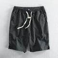 Men's striped cotton casual shorts in light blue with straight leg and mid waist design