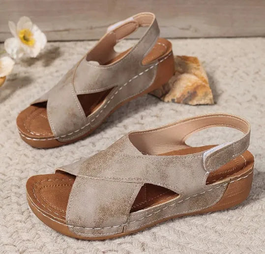 Roman platform sandals with decorative skirt and velcro closure in earth-tone colour