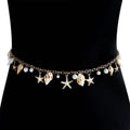 Women's silver alloy waist chain and bracelet set with star charms and beach shell pendant on white background