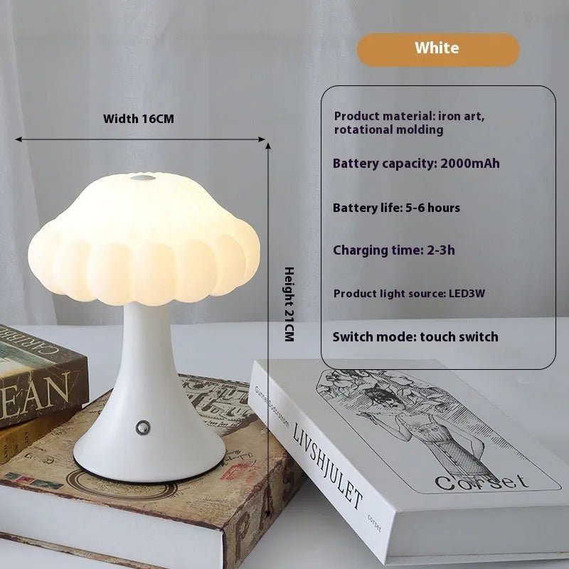 Small mushroom-shaped touch control night light in wood grain finish on a wooden table