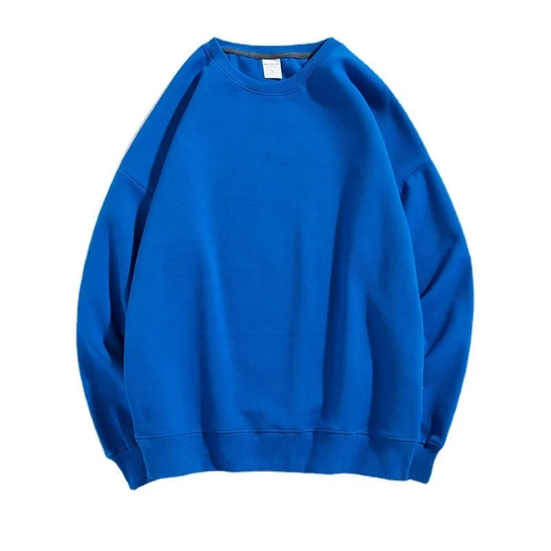 A loose-fitting, off shoulder, round neck cotton sweater in a solid colour with long sleeves.