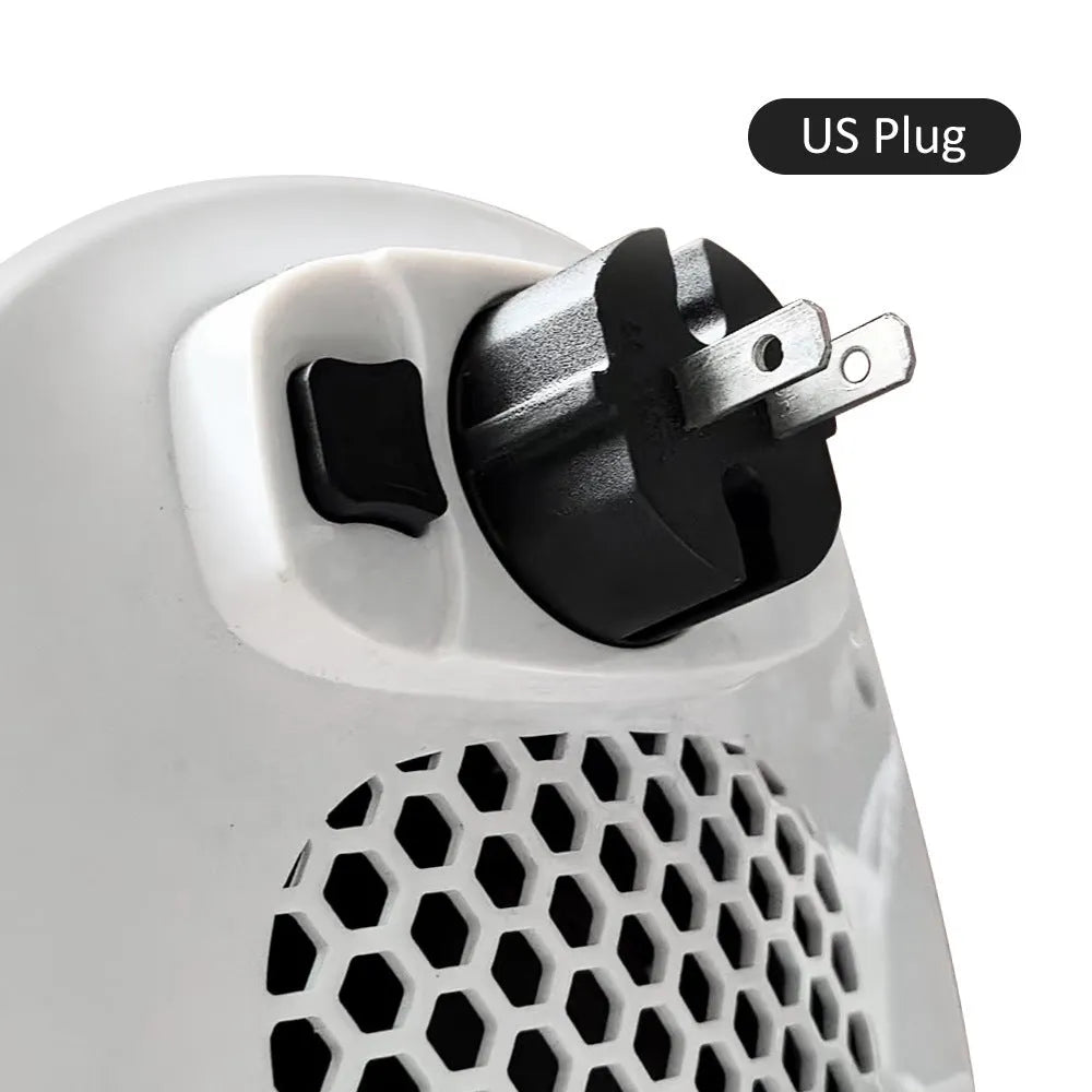 White ceramic heating electric hot air blower heater with remote control on wooden surface