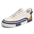 Men's beige canvas casual shoes with mesh side panels and flat heel