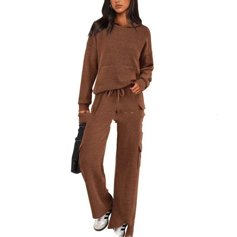 Women's polyester leisure sports suit with regular sleeves and matching trousers in multiple colour options
