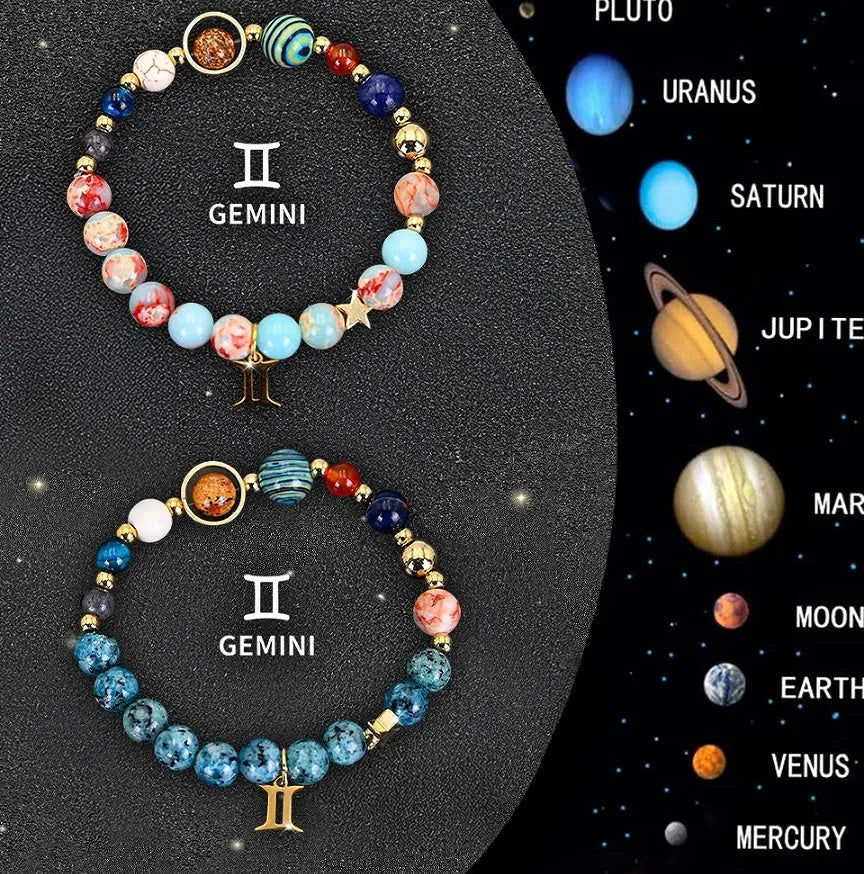Set of two natural stone beaded bracelets for twelve zodiac signs on a wooden surface.
