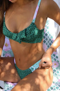 Green polka dot bikini swimsuit set with high-elasticity fabric.