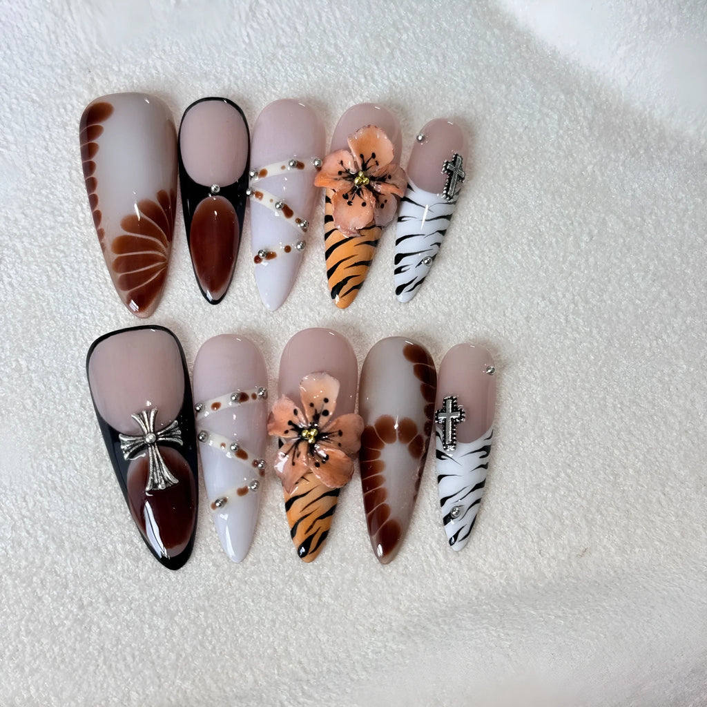 Set of long-tip nail stickers featuring leopard print, cross, and flower patterns in four sizes.