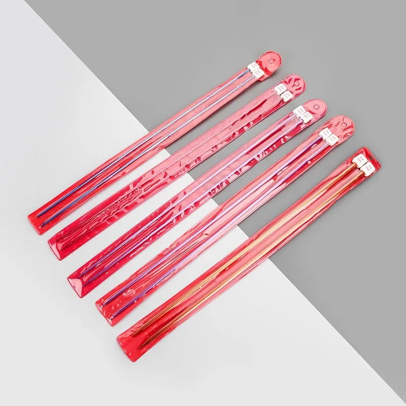 Set of crochet hooks in various sizes from 2.0mm to 10.0mm, each with a protective cap on a lengthened handle.