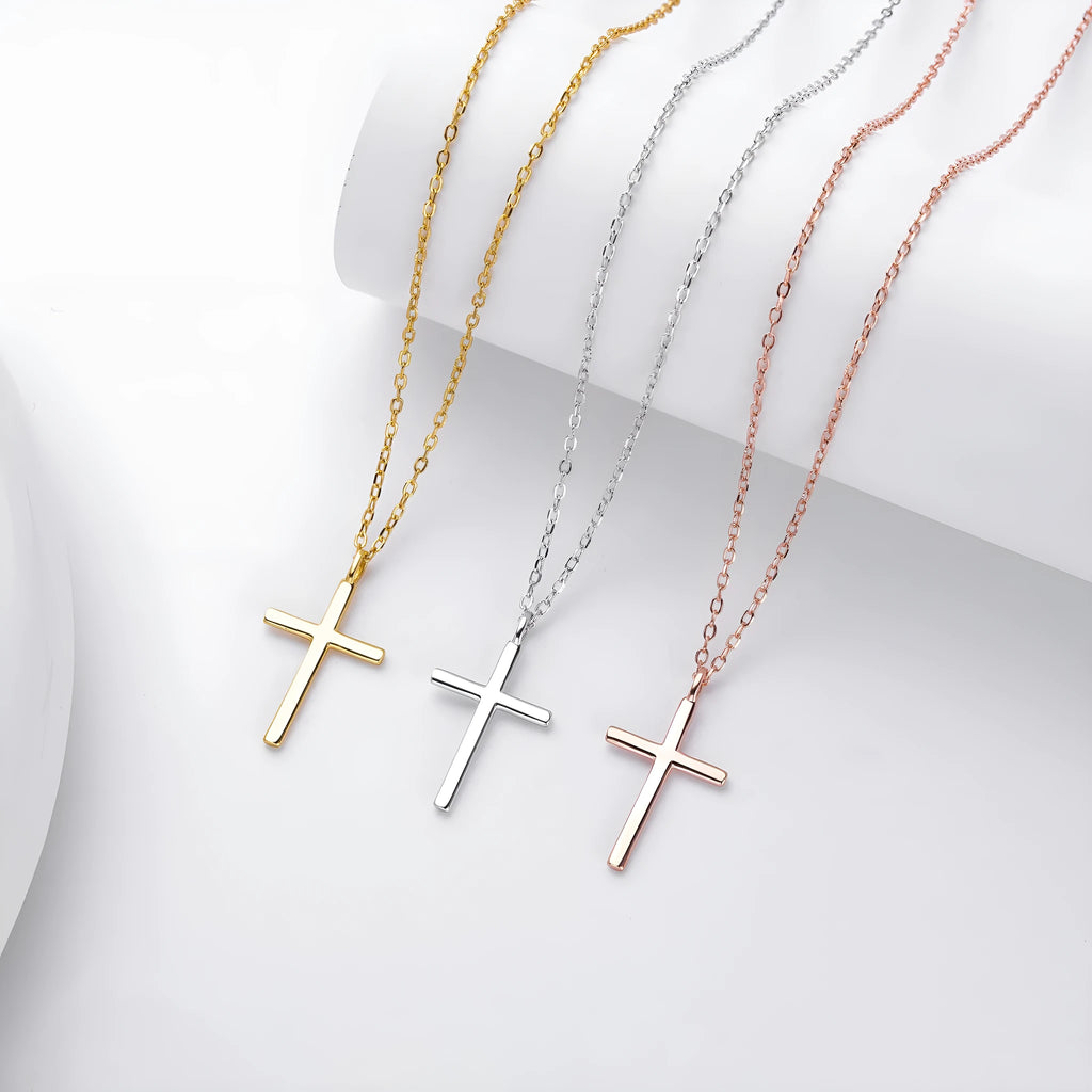 S925 sterling silver necklace showing simple glossy cross pendant on O-shaped chain in gold plating