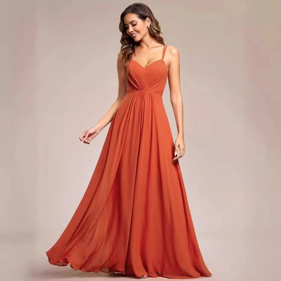 Women's sleeveless long A-line pleated dress in solid colour polyester fabric