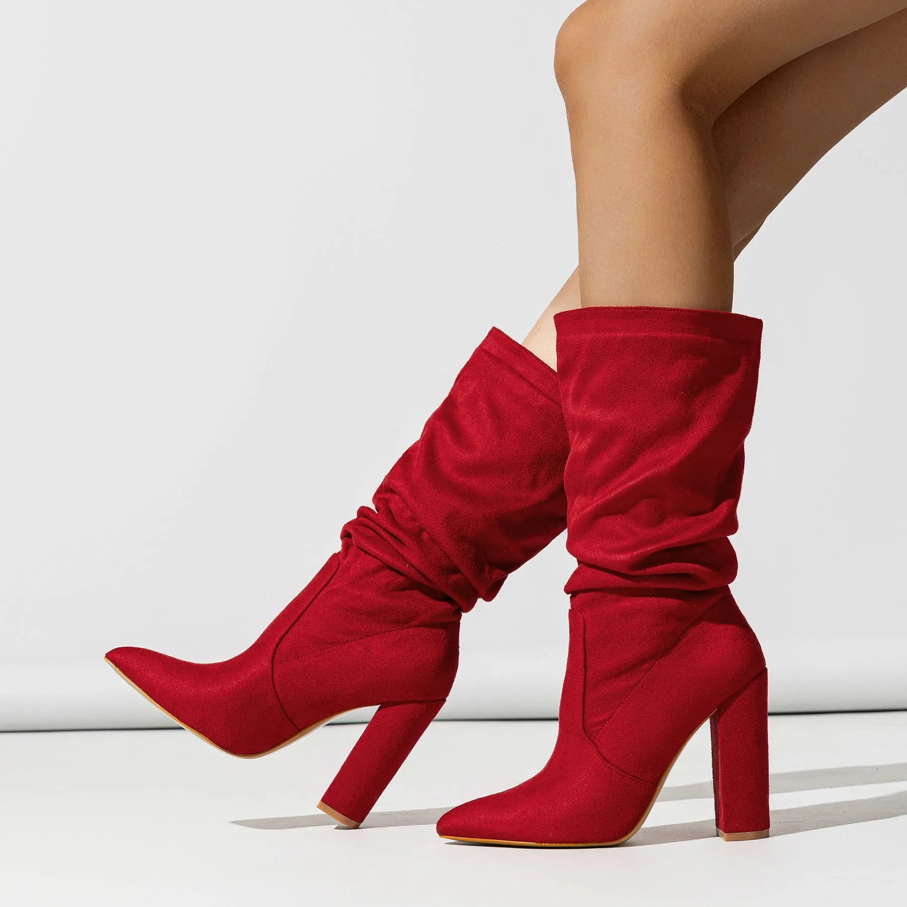 Women's chunky heel pointed toe ankle boots in suede available in black, apricot and red colours
