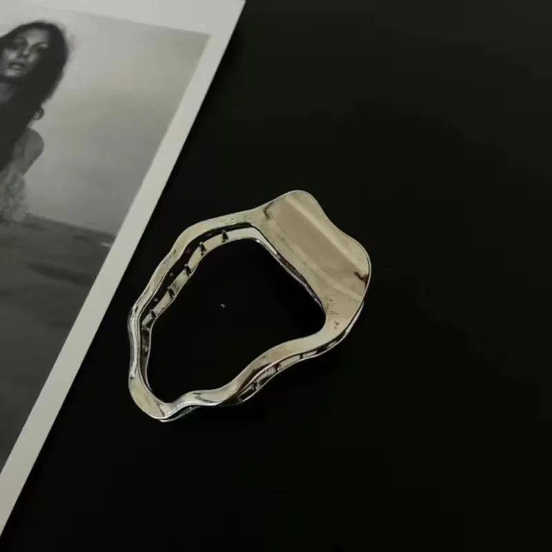 Women's zinc alloy hair barrettes in gold and silver with arc, square, and triangle shapes