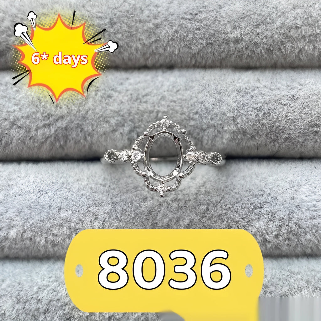 Oval denier ring with five-pointed star ornamentation and 6x8 mm main stone