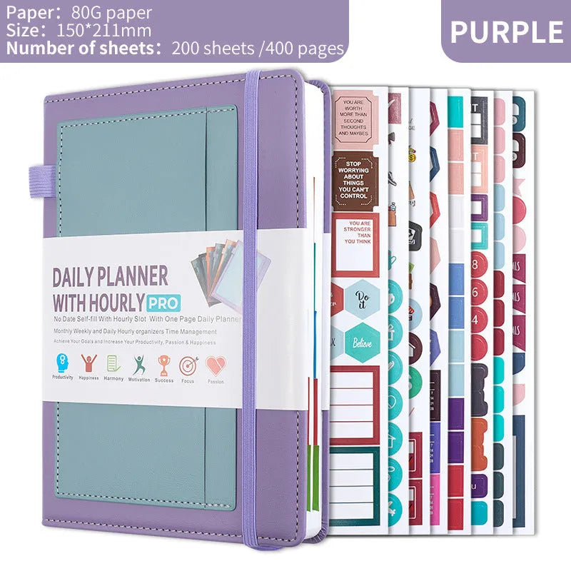 A5 notebook with purple PU cover closed by a black elastic strap