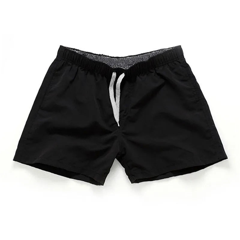 Men's plus size straight-leg beach shorts in multiple colours on a size chart.