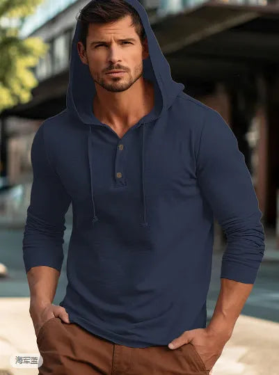 Men's dark blue cotton pullover hoodie with a hood and long sleeves on a hanger.