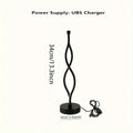 Black aluminium desk lamp with touch dimming buttons in blue and pink, showing three colour temperature modes