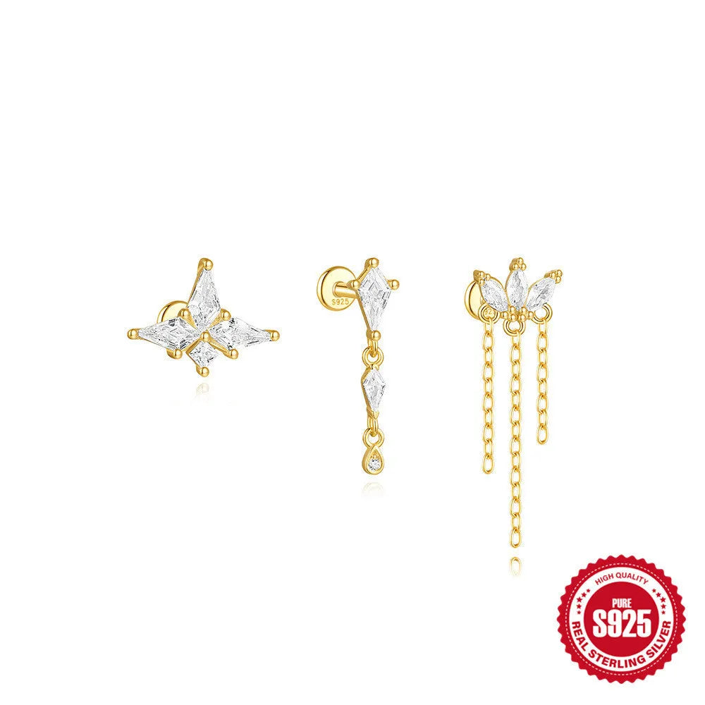 Geometric kite-shaped sterling silver earrings with a gold electroplated chain tassel featuring rhinestones.