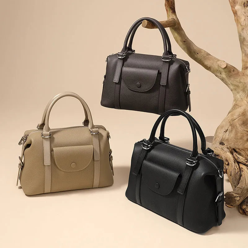 Genuine leather ladies handbag with combination lock and single strap in street trend style