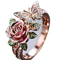 Adjustable butterfly ring with colourful oil drop finish and detailed floral insect leaf modelling