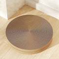 Green and white round cat scratching board with corrugated paper centre measuring 55 cm diameter