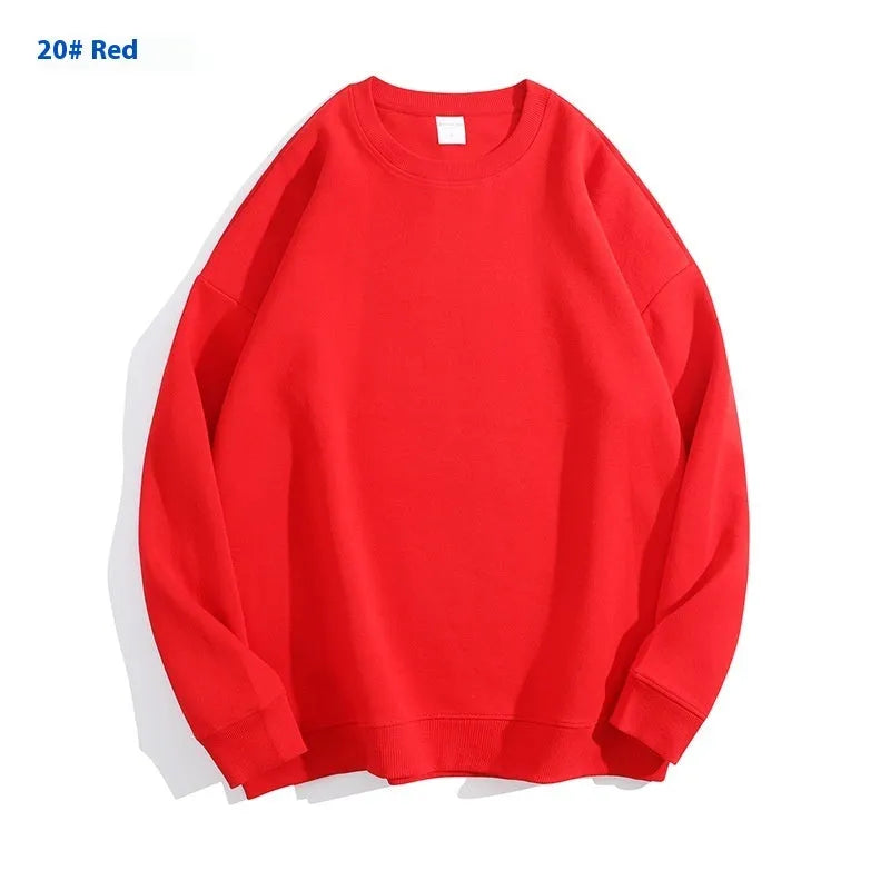 A loose-fitting, off shoulder, round neck cotton sweater in a solid colour with long sleeves.