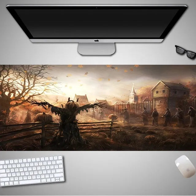 Large Halloween-themed computer mouse pad with graphic design on a desk