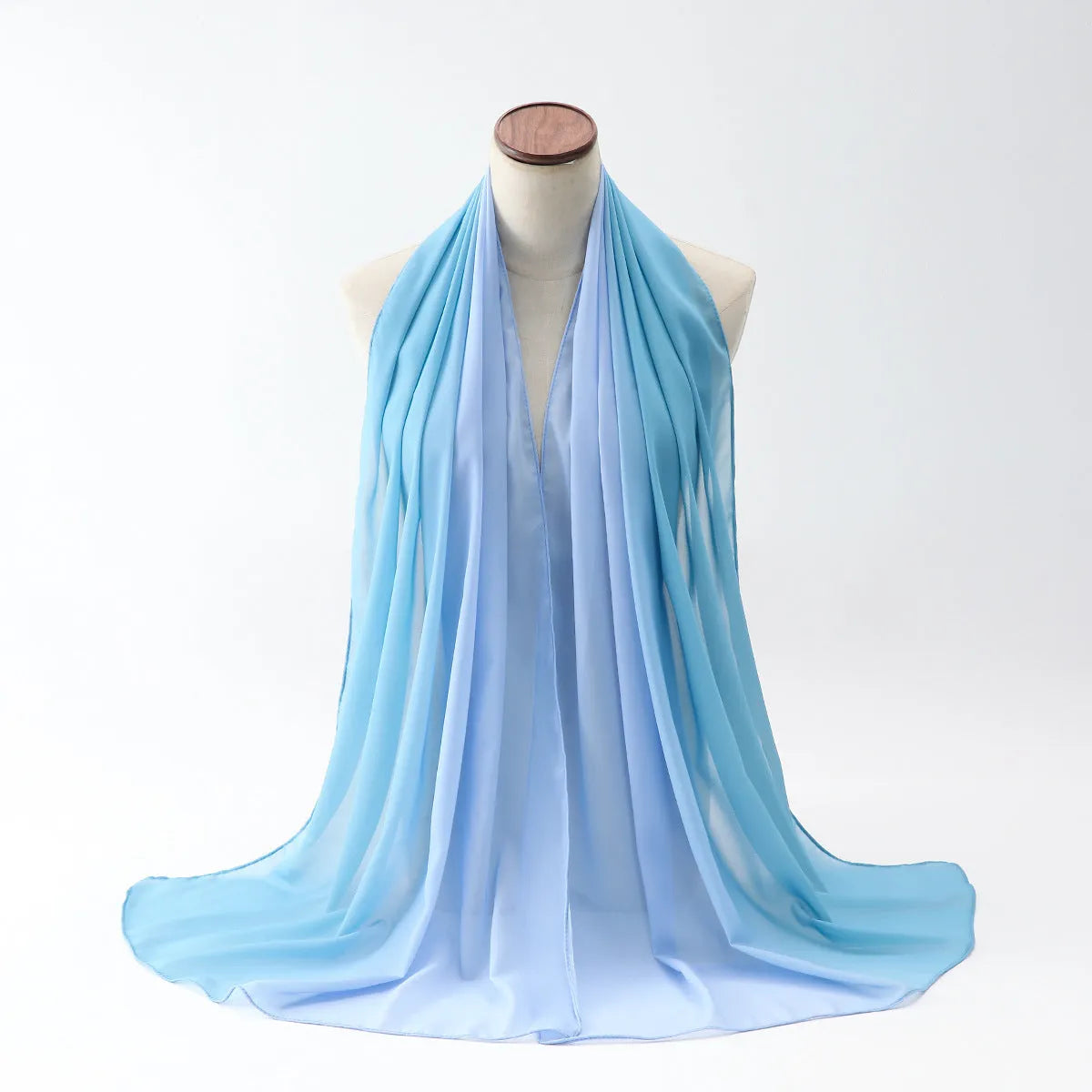 Long lightweight chiffon summer scarf for women draped to show its 175cm length and soft fabric.