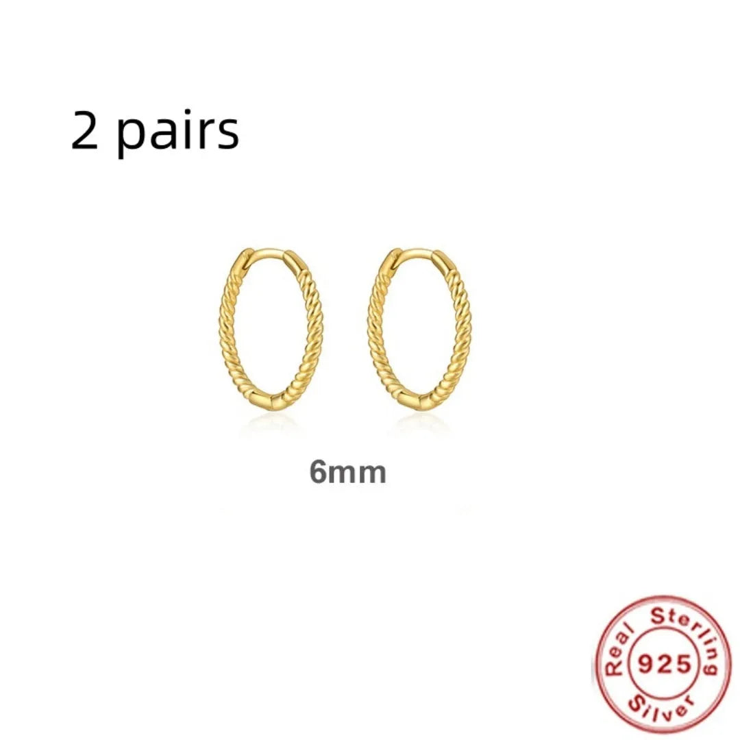 Sterling silver twisted ring earrings in geometric round design with gold or platinum finish