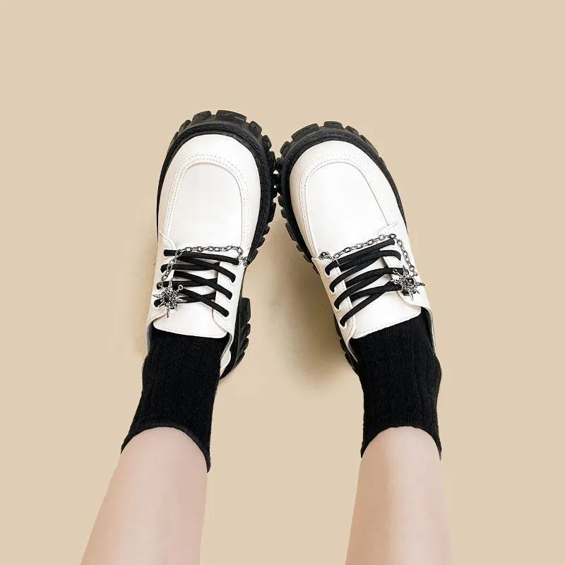 Women's Duke Asterism coloured loafers with a cross-strap and metal buckle, preppy style.