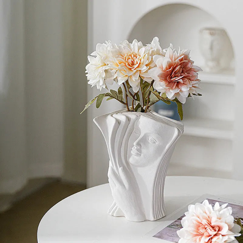 Glazed ceramic book stand ornament in a modern style on a desktop, shown in one of four design options.