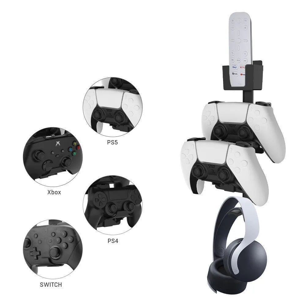 White ABS plastic wall-mounted hook holding a PlayStation game controller and headphones.