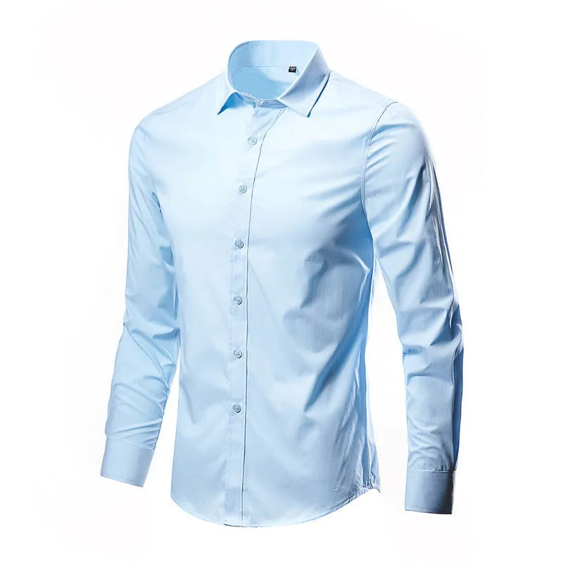 Man wearing a loose fit long-sleeve linen shirt in a neutral colour, showcasing the casual silhouette.