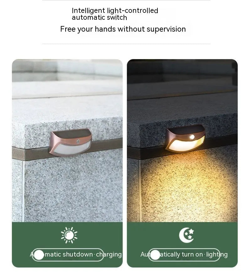 Solar-powered smiling face garden wall light with IP65 weather protection for outdoor courtyard and villa lighting
