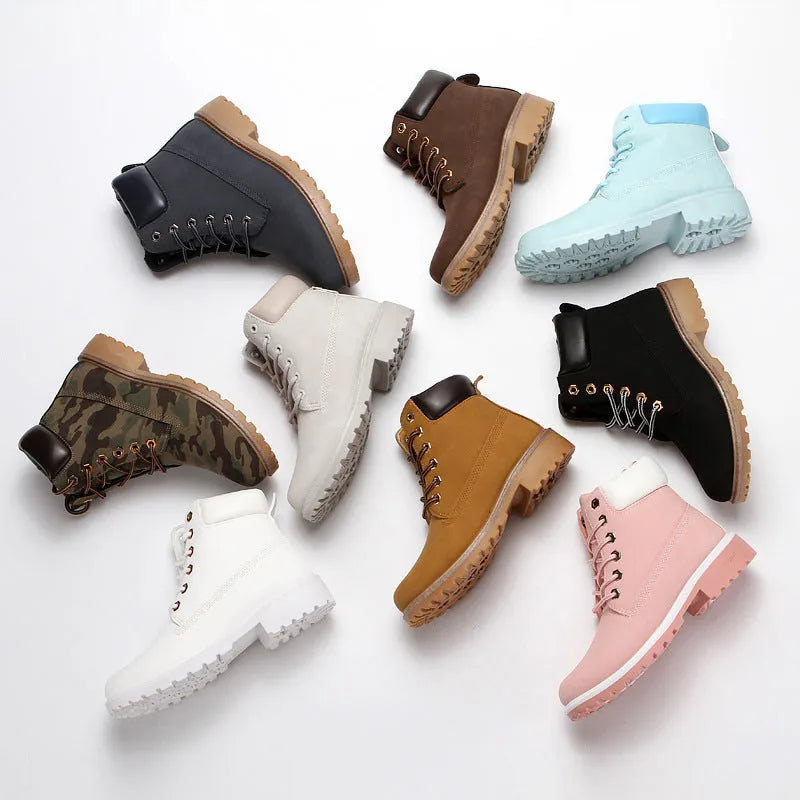 Men's pink Martin ankle boots with velvet lining, round toe, flat sole, and front lace-up closure.