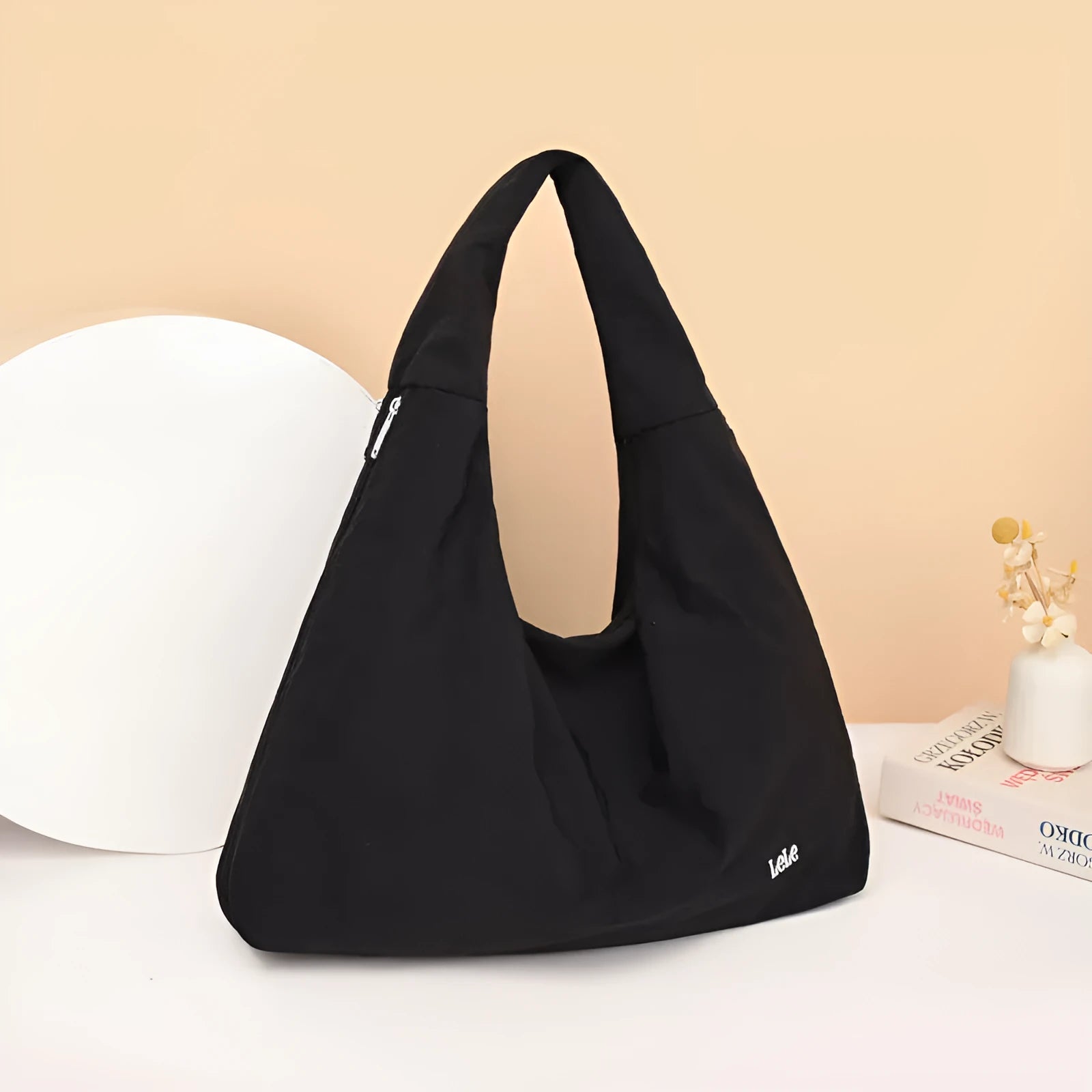 Women's heart-shaped nylon underarm bag in black, blue, khaki, and yellow colour options