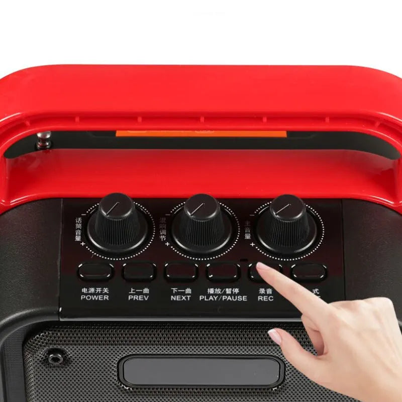 6.5-inch portable Bluetooth speaker with wireless microphone, measuring 241x145x329mm in plastic housing