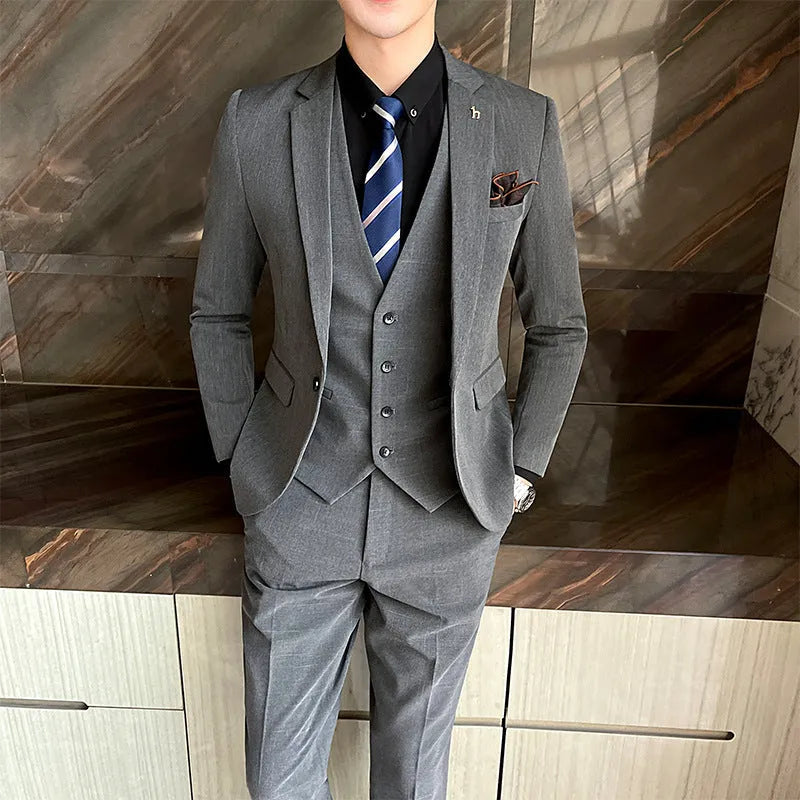 Slim fit British style business suit for men in black or dark grey cotton blend fabric