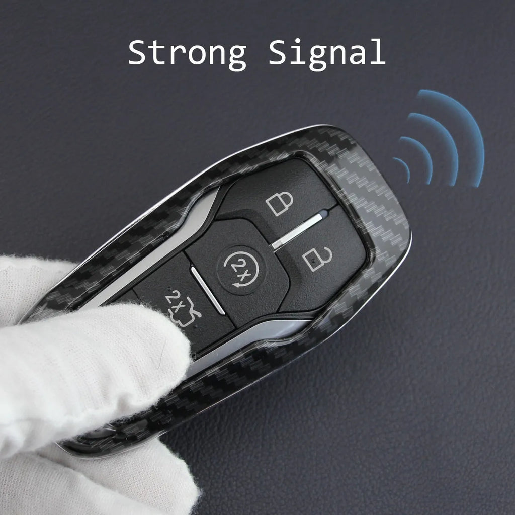 Plastic protective shell for a car key remote, shown in two colour variations