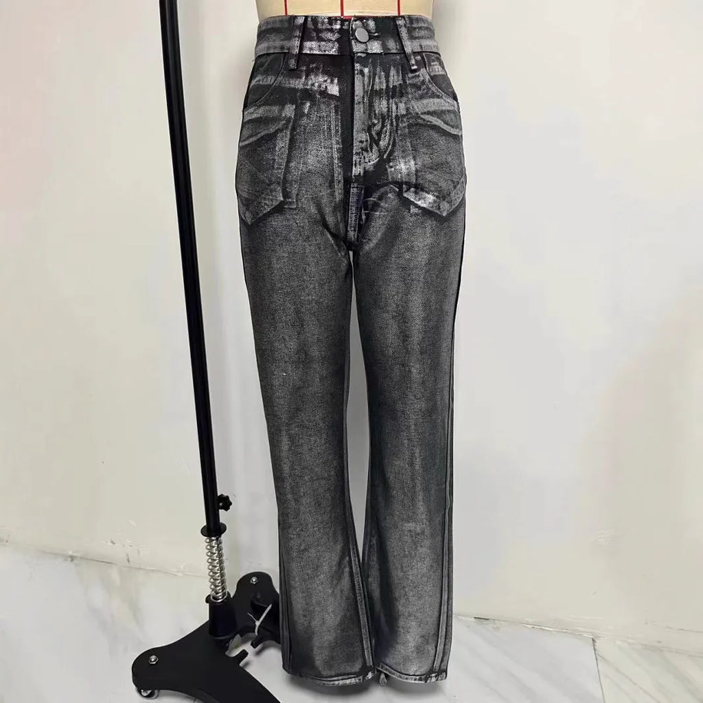 Washed blue high waist straight leg jeans on a model, showing contrast colour details.