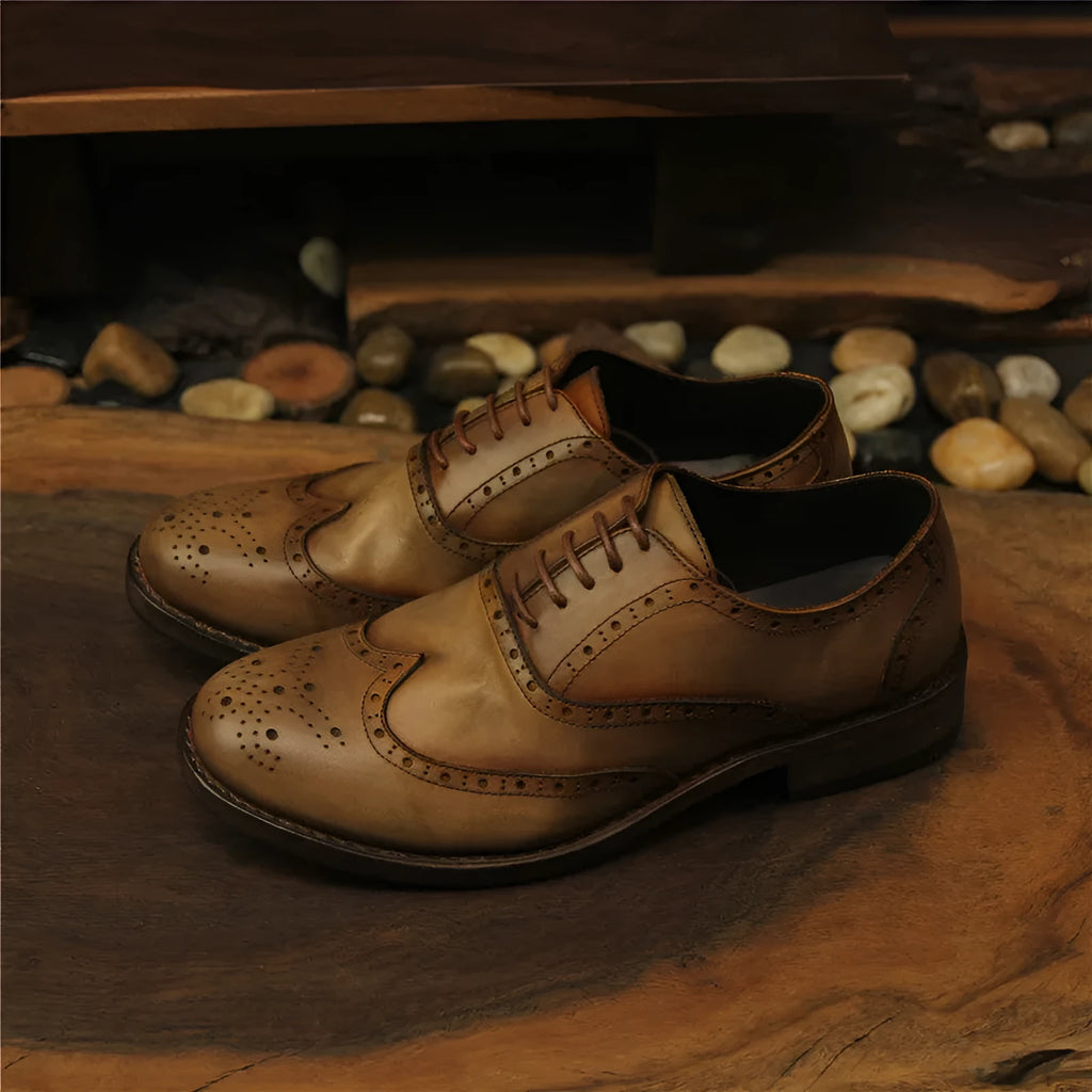 Light brown men's vintage engraved leather casual shoes with distressed finish and lace-up closure.