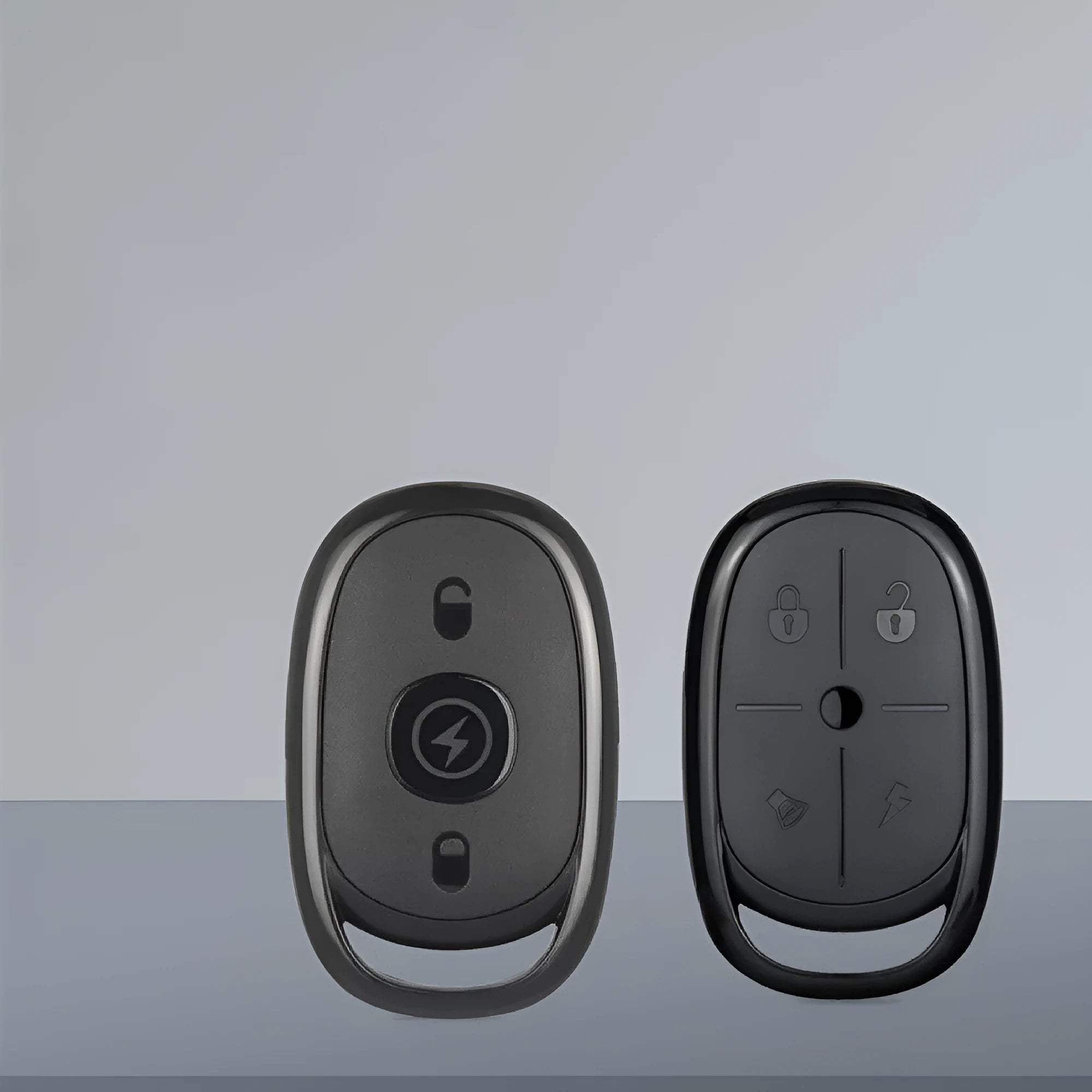 Compact black ABS plastic car remote control key fob with three buttons.