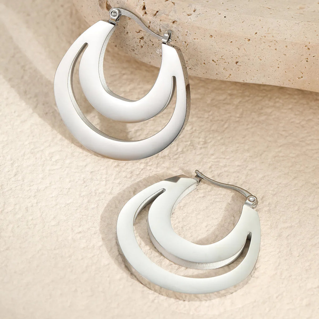 Pair of 18K gold plated geometric stainless steel French earrings with round ring minimalist design for women